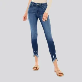 Medium-wash skinny jeans
 for ladies