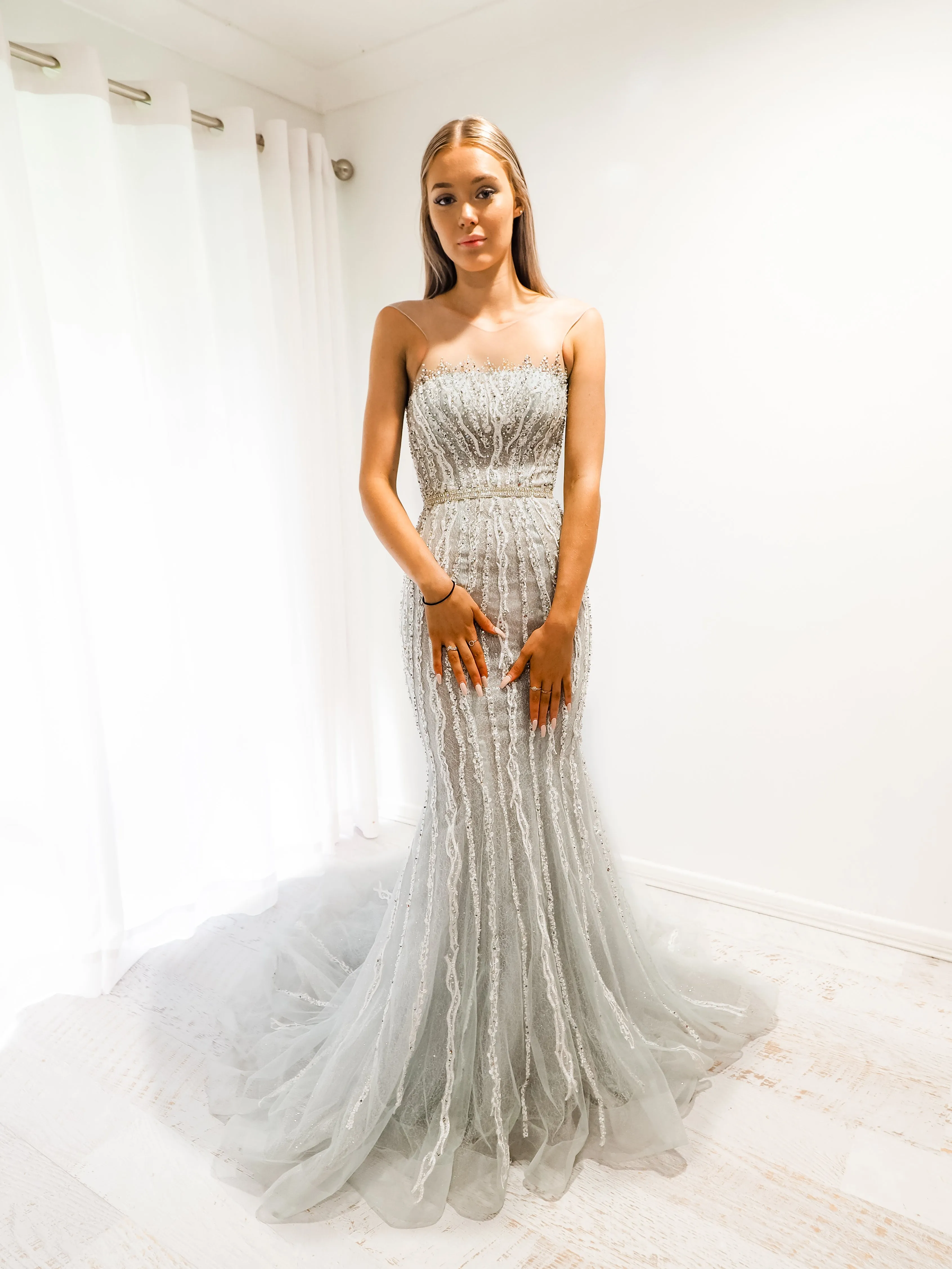 Silver mermaid dress with long train for hire