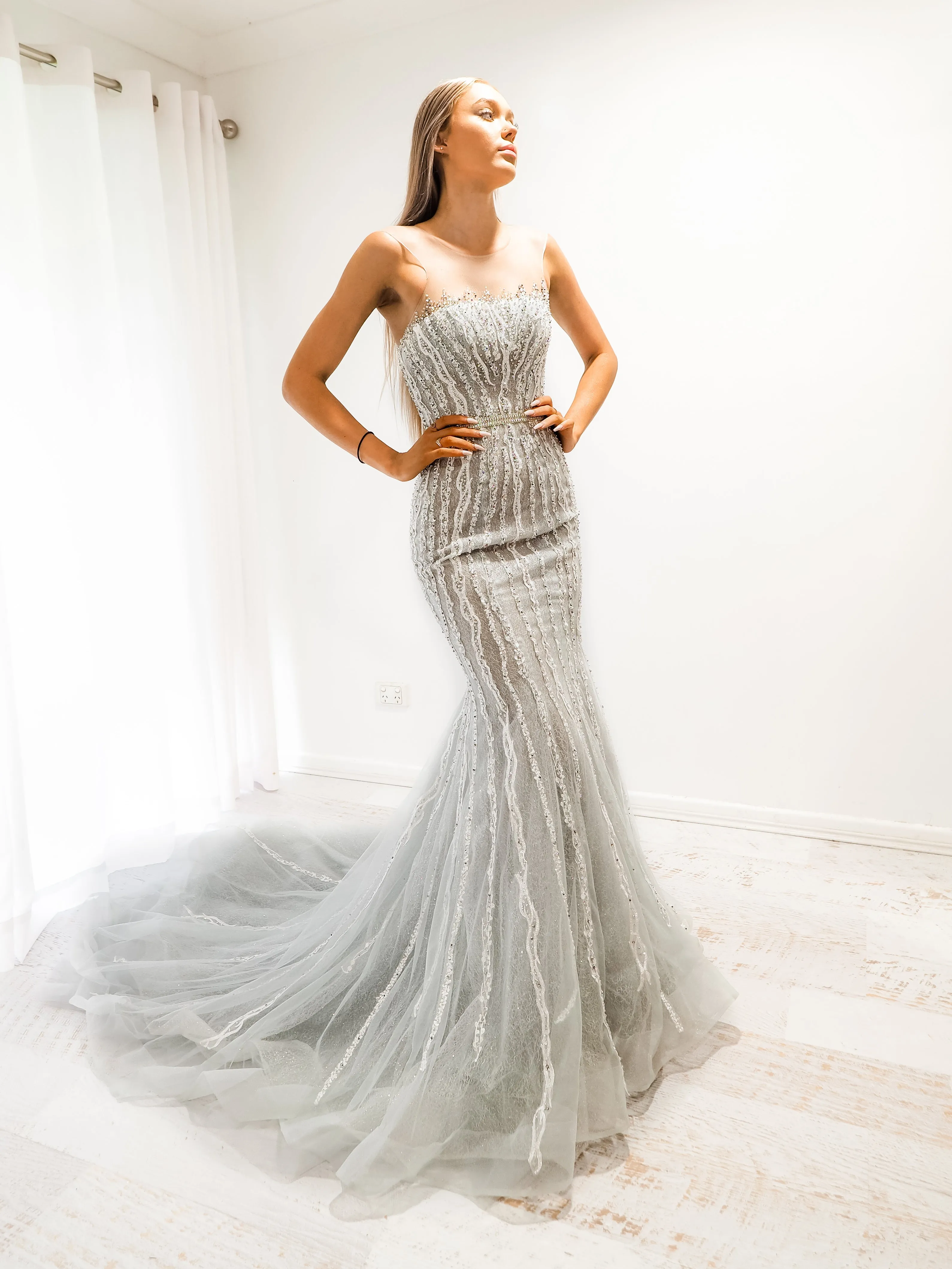 Silver mermaid dress with long train for hire