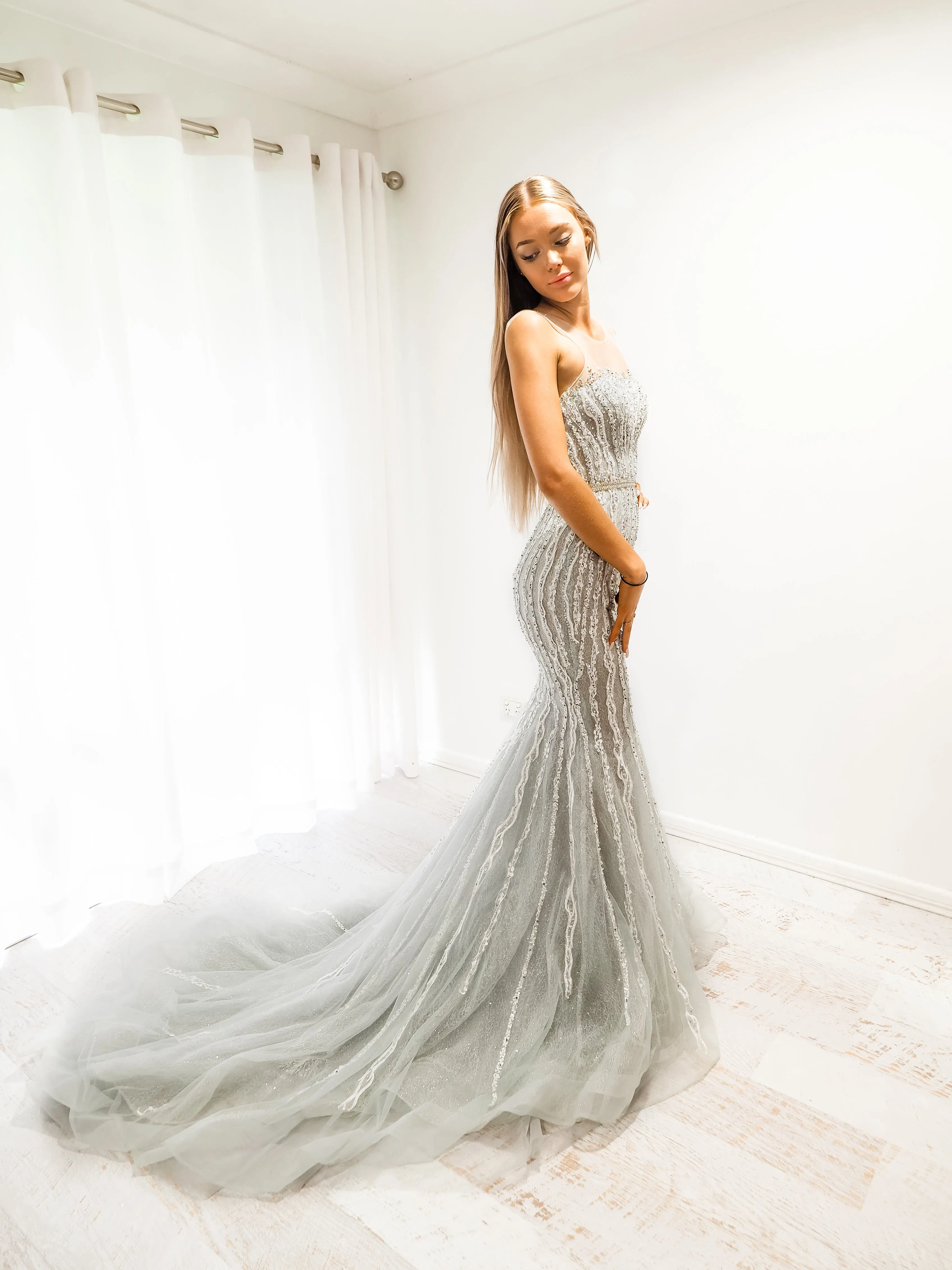 Silver mermaid dress with long train for hire