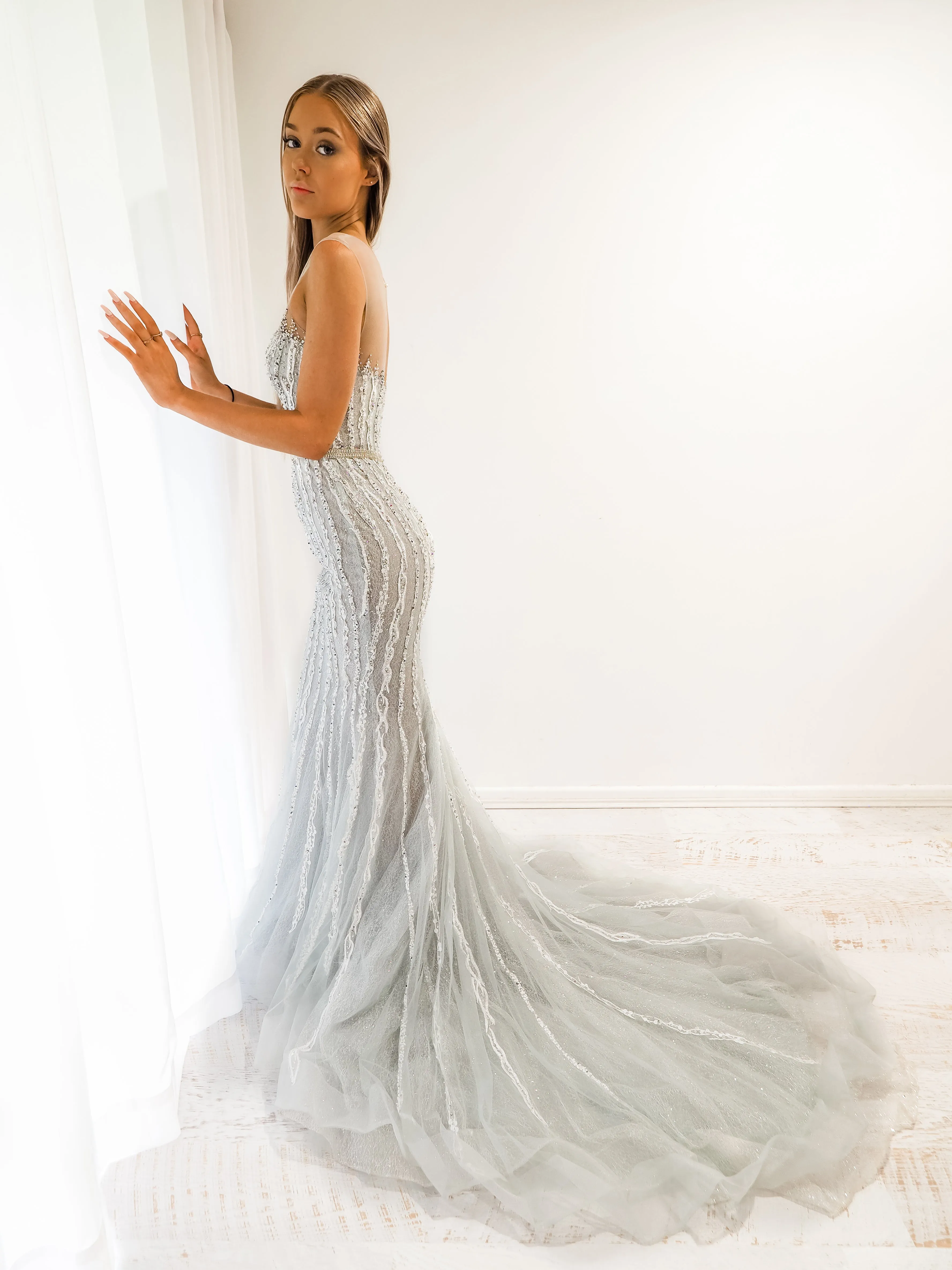 Silver mermaid dress with long train for hire