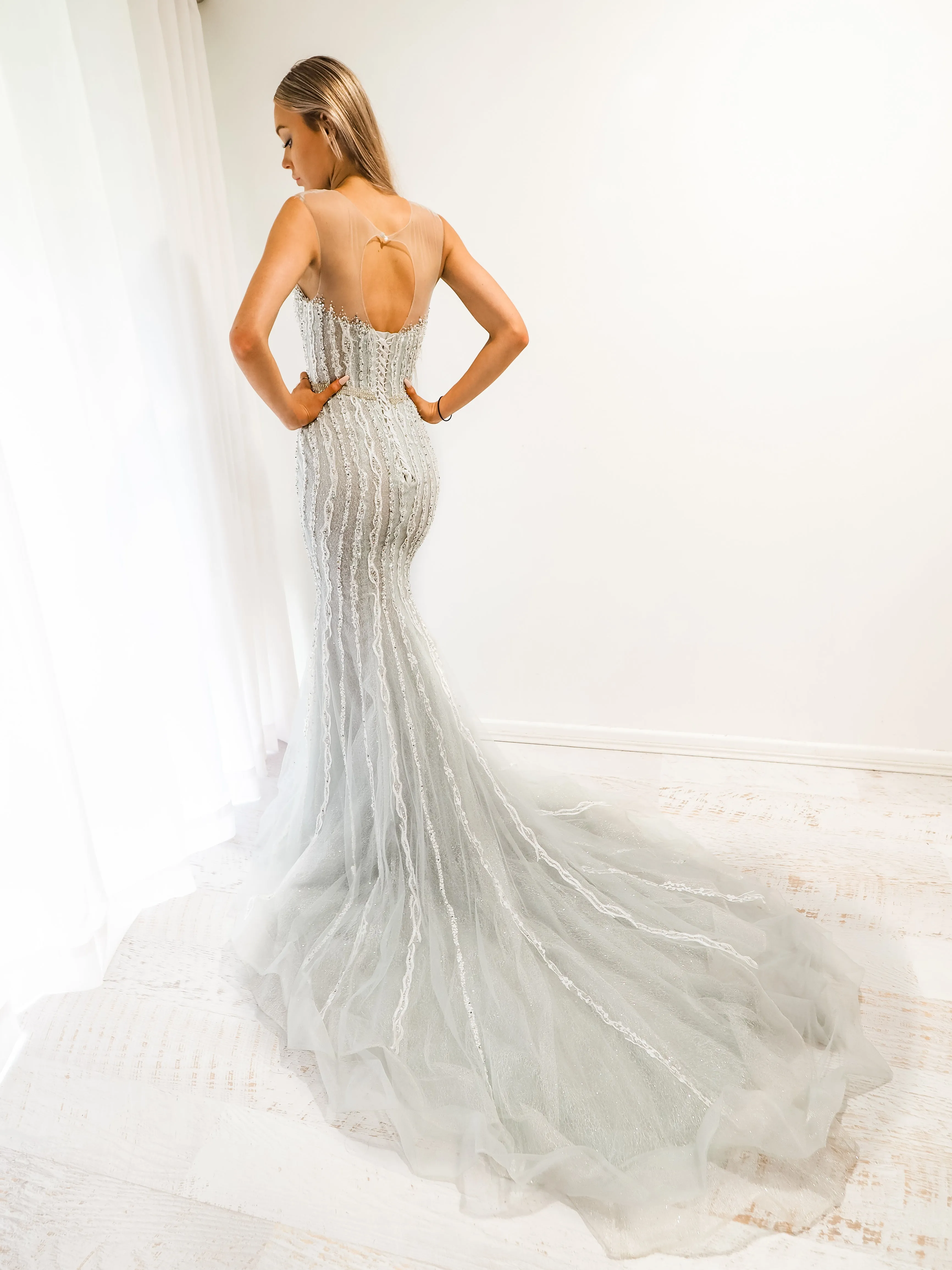 Silver mermaid dress with long train for hire