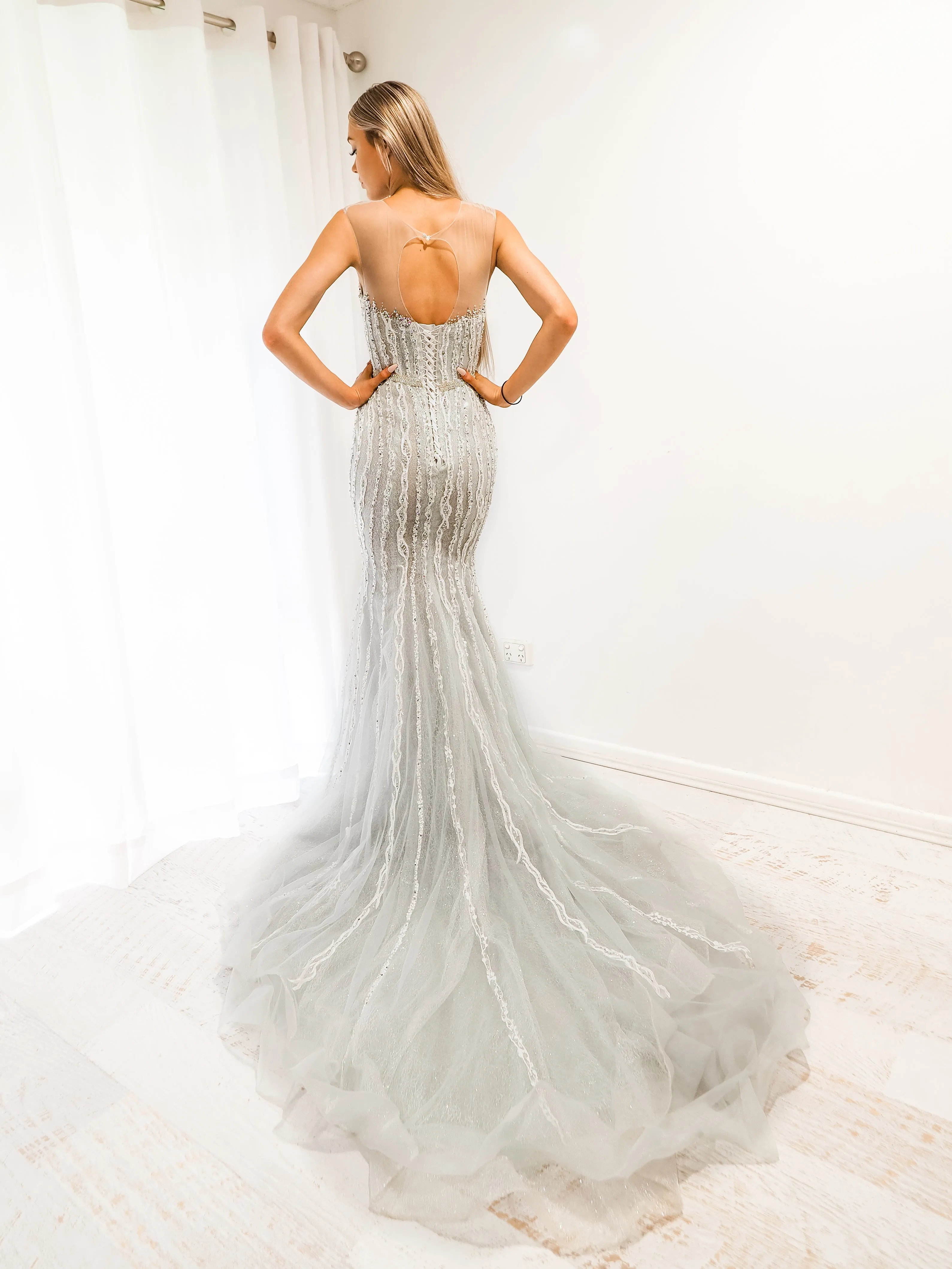 Silver mermaid dress with long train for hire