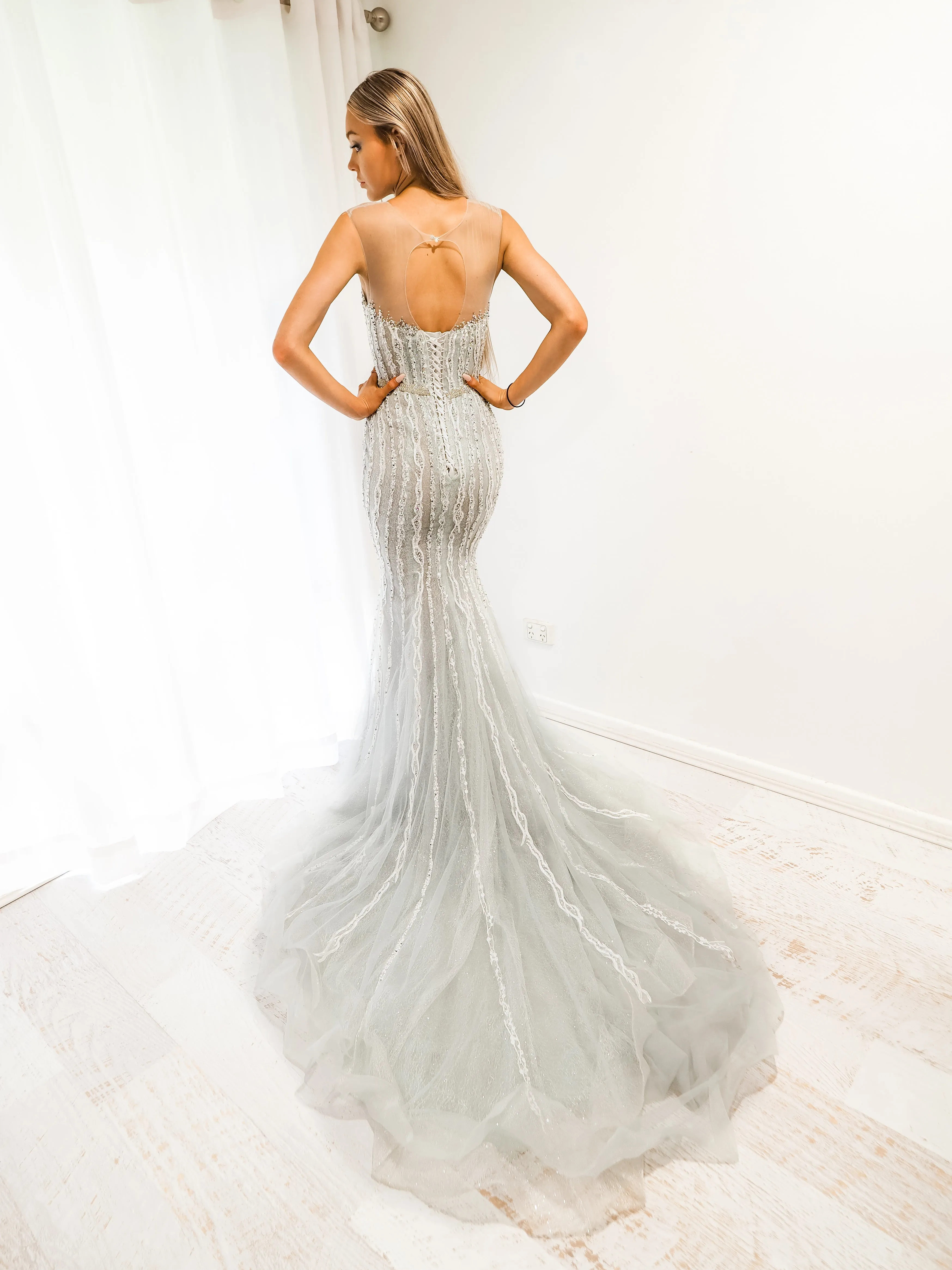 Silver mermaid dress with long train for hire